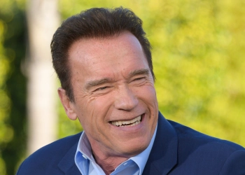Arnold Schwarzenegger Teeth: Dental History & Veneers